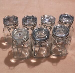 NEW! Set Of 7 Clear Glass Jars with Silver Metal Clip Lids